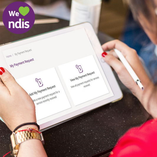 A person using their tablet to initiate a claim on their my NDIS portal