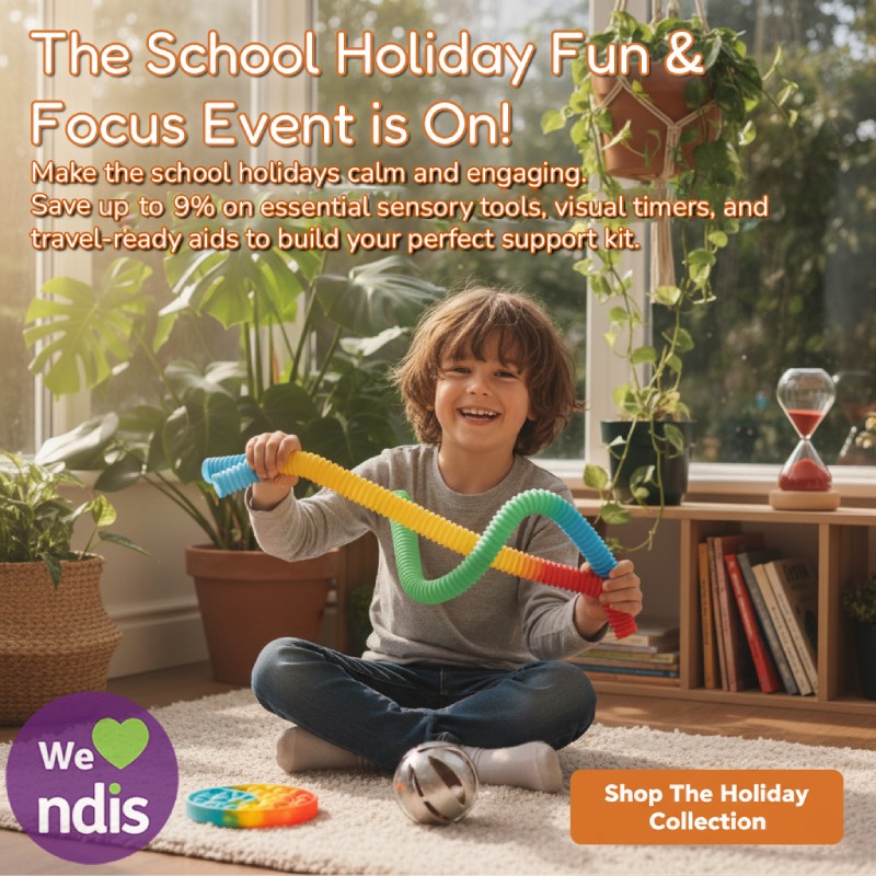 Child playing with a colorful toy in a room with plants and books, promoting a holiday event for sensory tools and support kits.